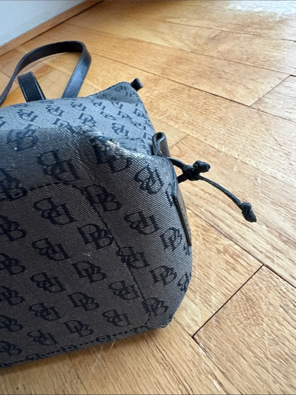Dooney Black Patterned Tote Bag with Grommet Detail - woman’s